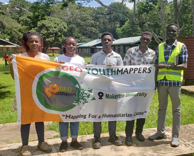 The Budongo Conservation Field Station project team in Masindi district for the data validation exercise. From left to right, Kasande Jemimah, Aceng Sheila, Ainomujuni Griffin, Masaba Mathias, and Jurua Michael